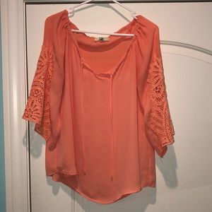 Bright pink, lace sleeved blouse